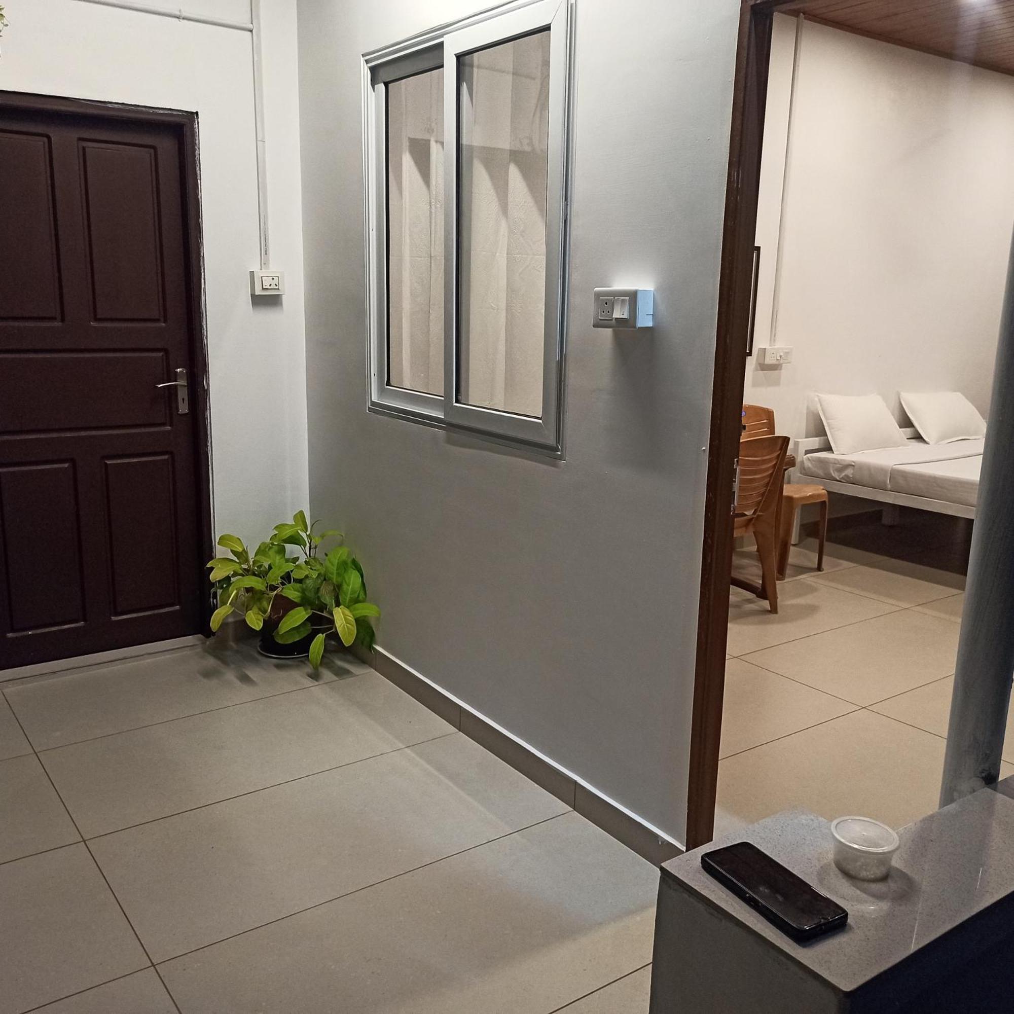 Bethesda Inn Kochi Стая снимка